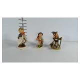 3 figurines: 2 Hummels with damage and one
