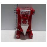 Coca-cola snow-cone machine with plastic cone,
