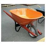 Orange wheelbarrow, metal