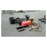 Group with plastic flower pots, hand saw, painter