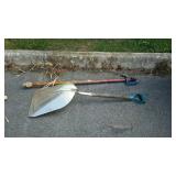 Shovel and a water spigot