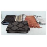 Lot of 5 rugs and bathroom mats. Includes two rag