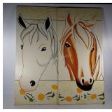 Two horse faces wall hangings, each measures