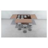 Box of 12 pint sized Ball mason jars with lids.