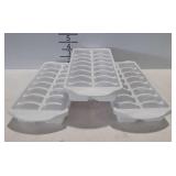 Three sterilite ice trays.