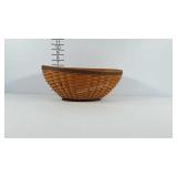 Oval shaped Longaberger Basket. Opening measures