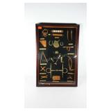 Polo tack shadow box, one mallet has slipped down