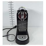 Nespresso Coffee maker, model D111. Powers on.