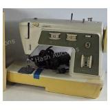 Singer portable sewing machine,  model 774.