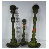 Metal ladle wall decor, painted green and black.