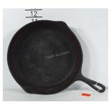 9 inch cast iron skillet. No marking except the