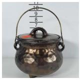 Metallic brown pottery kettle with wire bail