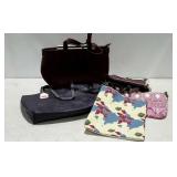 Group lot of ladies handbags.