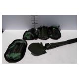 Four folding trench shovels with cases, 16" long.