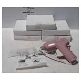 Six mini glue guns with glue sticks.