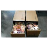 Two file drawer boxes of adult content magazines.