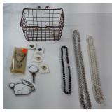 Small wire basket with costume jewelry and 2 slag