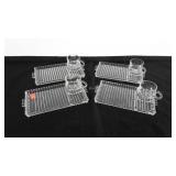 4 glass snack trays with matching cups.