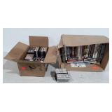 Cassette tapes and paperback novels. See pics for