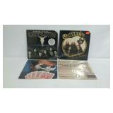 Four OUTLAWS record albums with jackets.