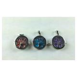 Three howlite tree of life pendants red, blue,