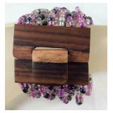 Black and purple seed bead stretch bracelet with