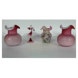 Pink vases and pink glass angel figurine. These