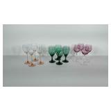 3 sets of 4 wine glasses.