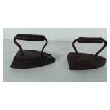 Two cast iron sad irons