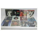 Twelve ELVIS record albums with jackets. Some