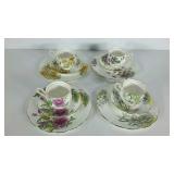 Set of four cups, saucers and dessert plates,