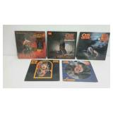 Five OZZY OZBOURNE albums with jackets.