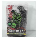 Toy, glow in the dark Godzilla in box, unopened