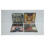 Four THIN LIZZY record albums with jackets.