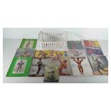 Small basket of body building magazines, includes