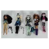 5 Monster High dolls plus a few accessories.