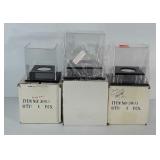 3 display cases: 2 baseball and 1 softball, with