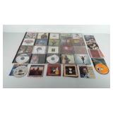 Box of CDs, includes Patsy Cline, Toby Keith,