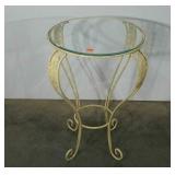 Metalworks stand with beveled glass top. Leaf