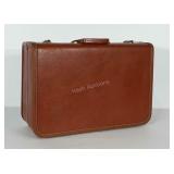 Taperlite suitcase. Base measures 8x21 inches and