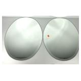 Pair of beveled oval mirrors, each measure 21x31
