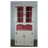 Painted corner cabinet. Glass upper doors, solid