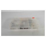 Plano tackle box with fishing hooks and lures