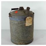 13" oil can with handle, has a dent in