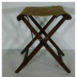 Folding canvas stool, 18" to seat, marked as