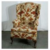 Arm chair, pheasant print, one side faded