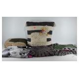Linens, large decorative throw pillow, blankets,