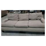 Tan nubby finish sofa, 8