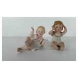 Porcelain piano Baby figurines, 4 and 5"