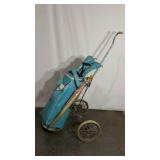 Golf bag with clubs and cart, vinyl